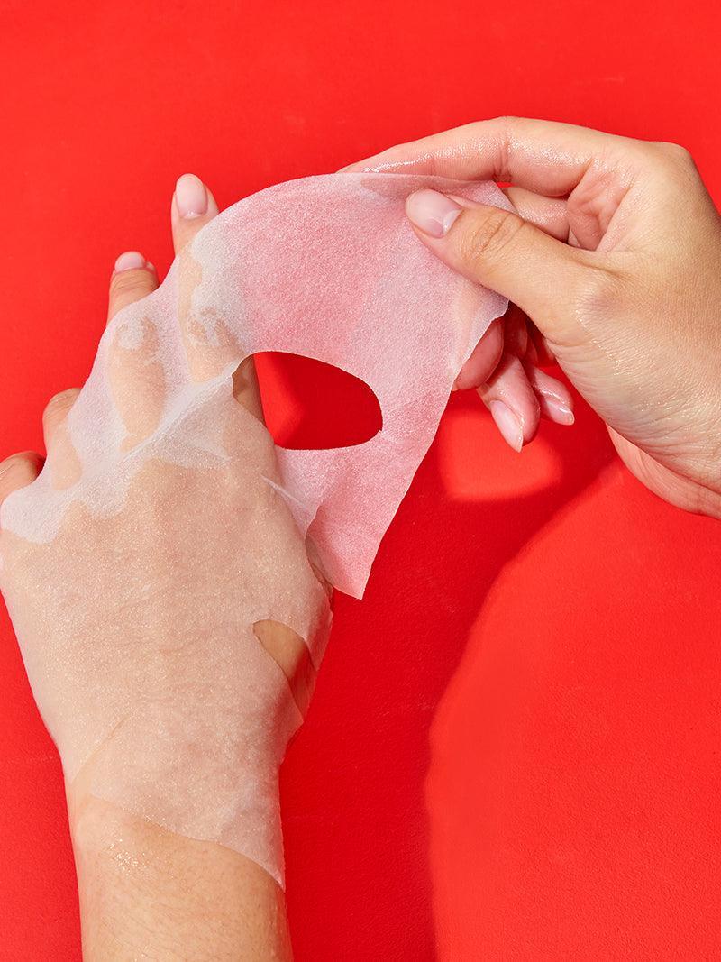 Close-up of the essence-soaked COSRX AC Collection sheet mask