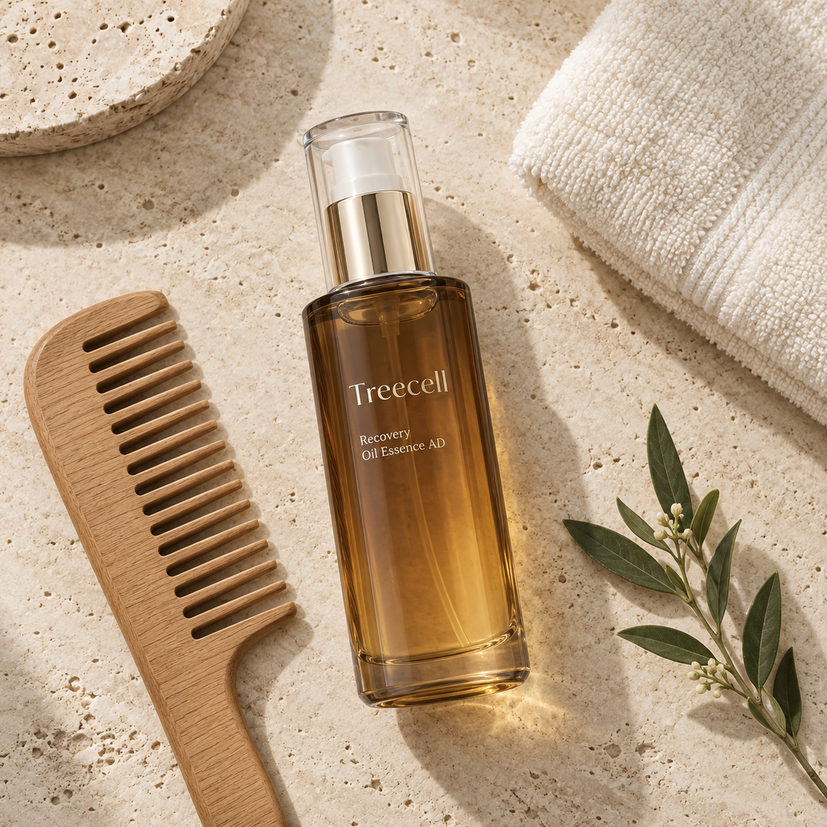 Treecell Recovery Oil Essence AD hair oil with comb and botanical sprig