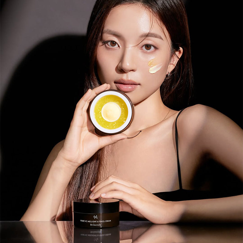 Model holding the Dr.Ceuracle Pure VC Mellight A-Tinol Cream 70g jar